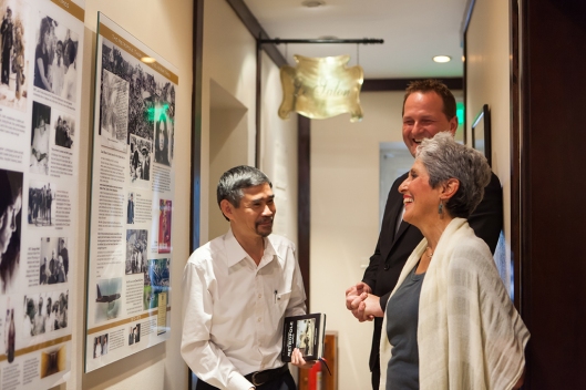 General manager Kai Speth and History Ambassador Duc show Joan Baez through the Path of History