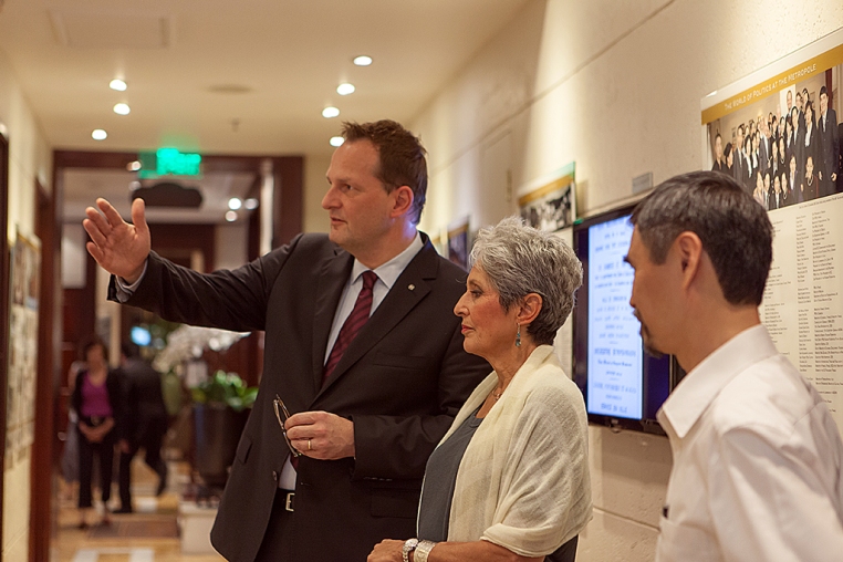 General manager Kai Speth and History Ambassador Duc show Joan Baez through the Path of History